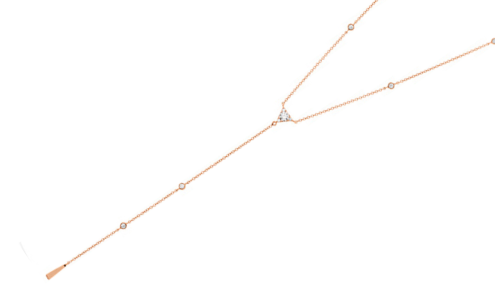 A rose gold lariat necklace with bezel set diamonds from Hearts on Fire, available at Chrono Jewelry.