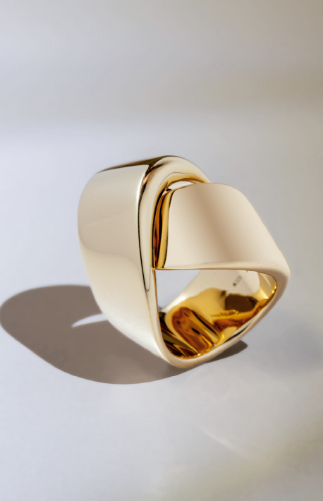 A yellow gold architectural ring