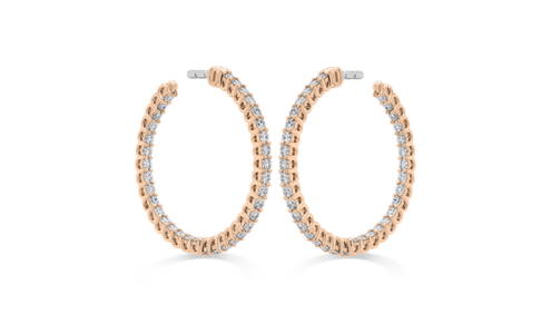 A pair of rose gold diamond hoop earrings from Hearts on Fire, available at Chrono Jewelry.