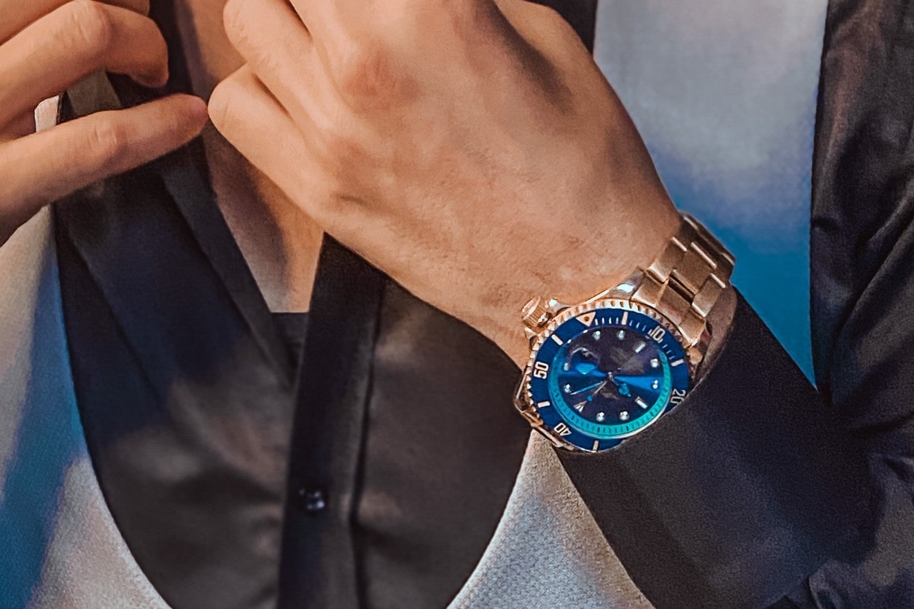 close-up of a man’s wrist wearing a fine timepiece