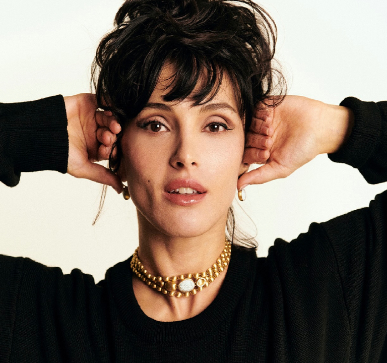 Nanis at Chrono banner featuring a woman wearing Vhernier Jewelry