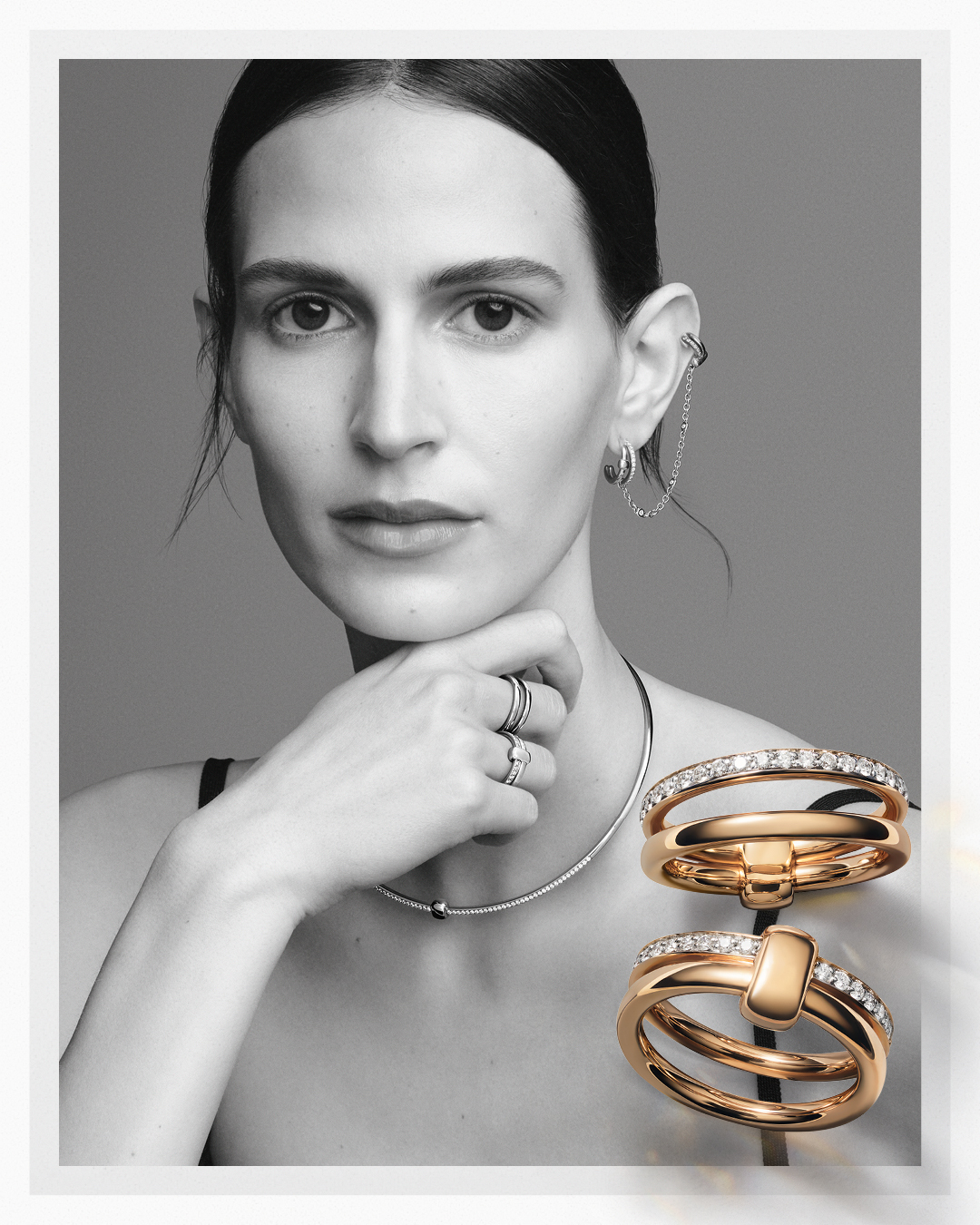 A black and white image of a woman wearing a ring, necklace, and earring from the Pomellato Together Collection